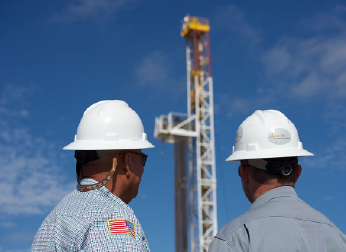 Two men in hard hats.